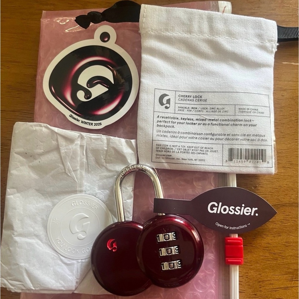 Glossier limited edition cherry lock and sticker! Brand new